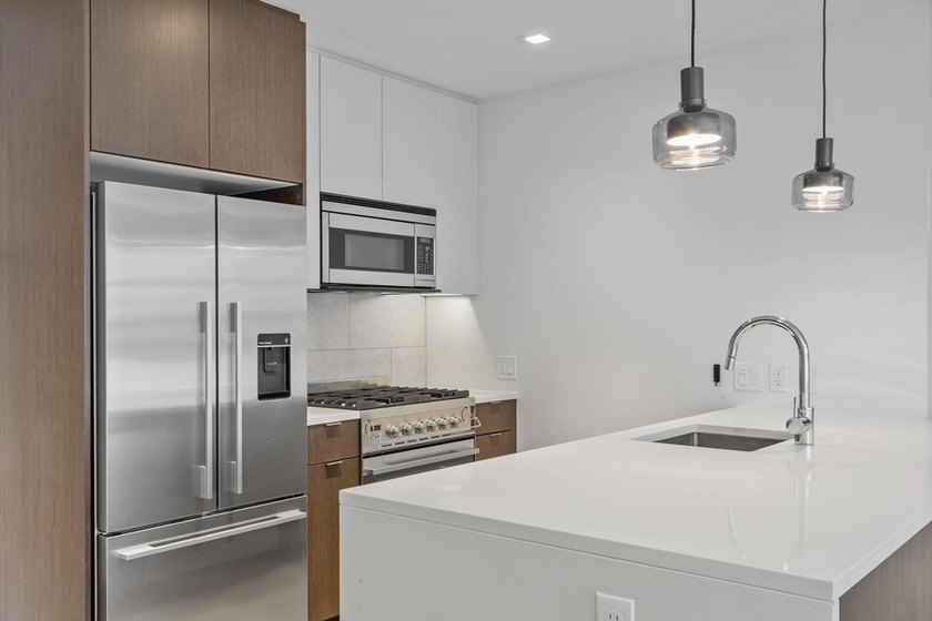 GARAGE PARKING (#45) INCLUDED! Overlooking the vibrant Lawn at - photo 6