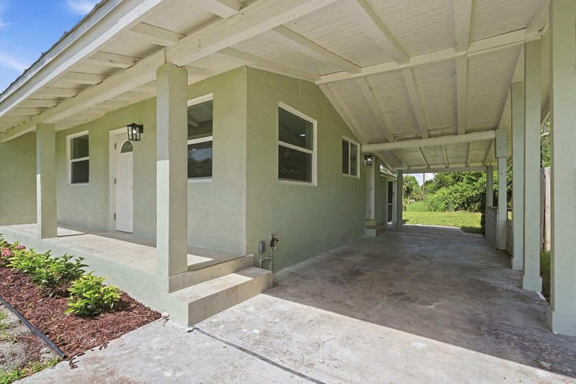 This charming single family home is tucked away in the back - photo 6