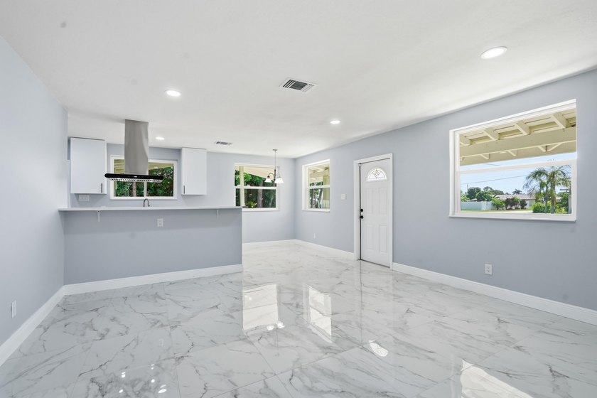 This charming single family home is tucked away in the back - photo 9