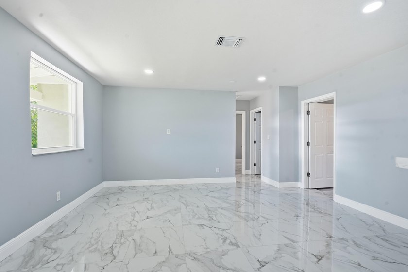 This charming single family home is tucked away in the back - photo 10