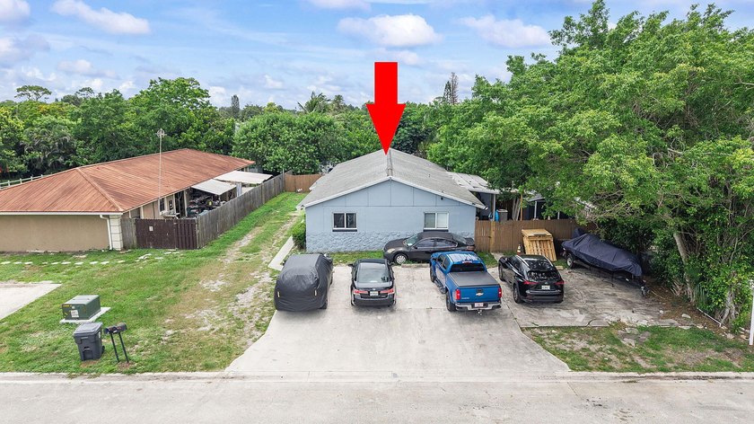 Exceptional investment opportunity! This CBS duplex features two - photo 2
