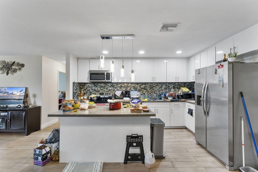 Exceptional investment opportunity! This CBS duplex features two - photo 3