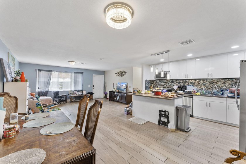 Exceptional investment opportunity! This CBS duplex features two - photo 5