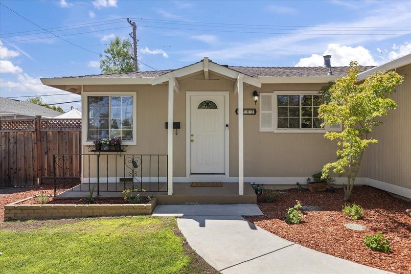 Welcome to this charming single-story home in the highly - photo 2