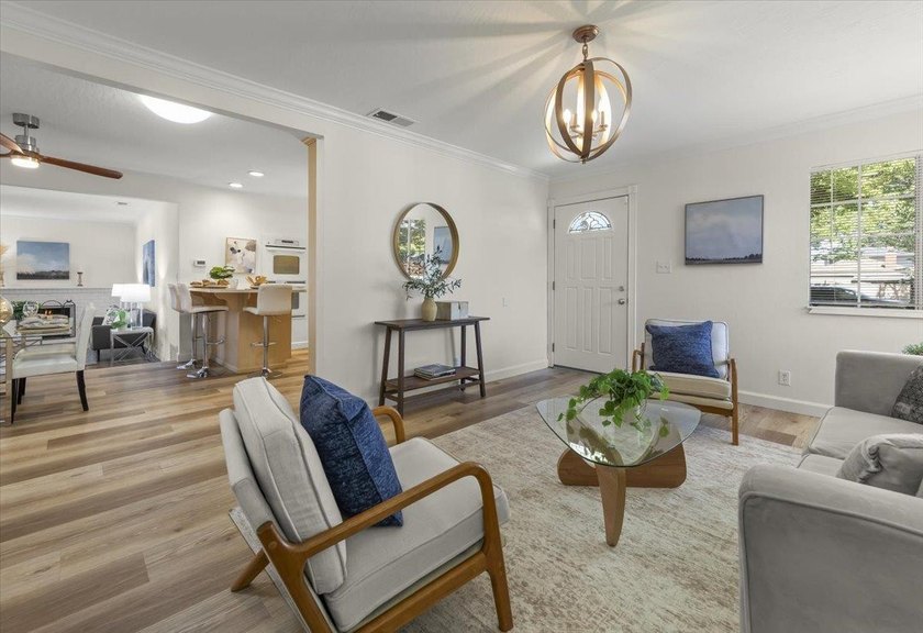 Welcome to this charming single-story home in the highly - photo 3