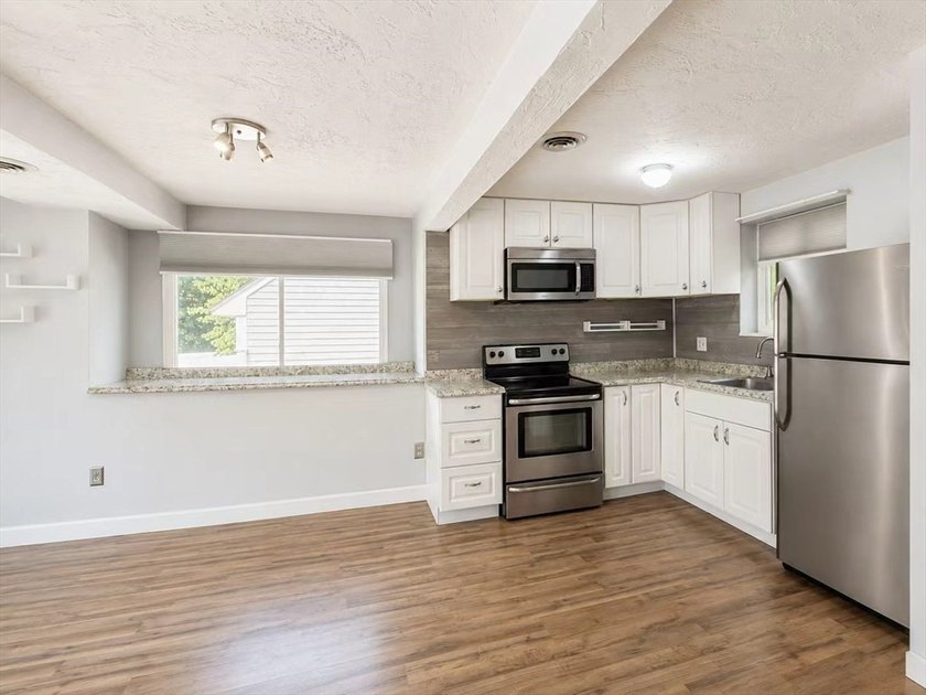 Welcome to pristine living in the highly desirable Whitman Pond - photo 5