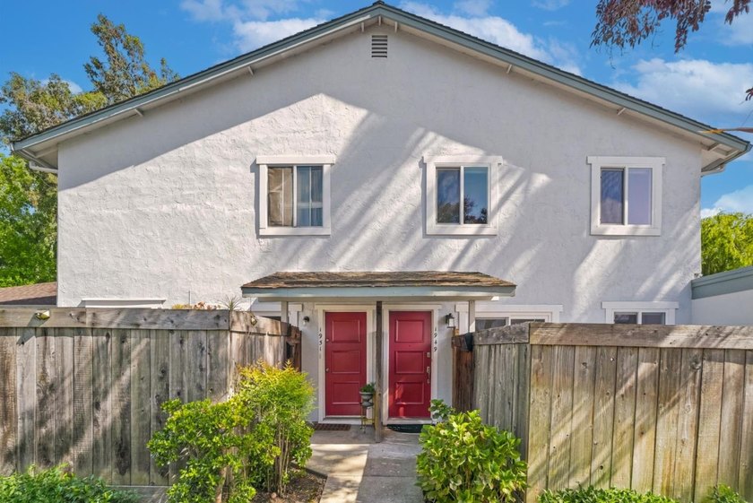 Welcome home to this beautifully updated townhome nestled in a - photo 2