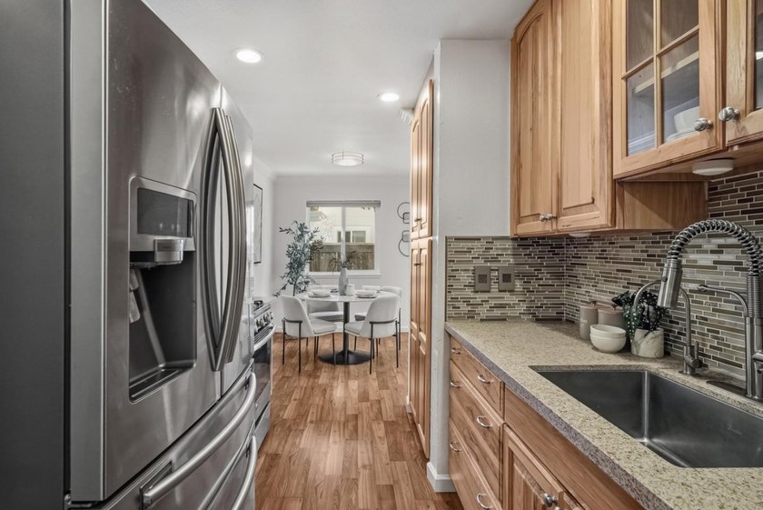 Welcome home to this beautifully updated townhome nestled in a - photo 8