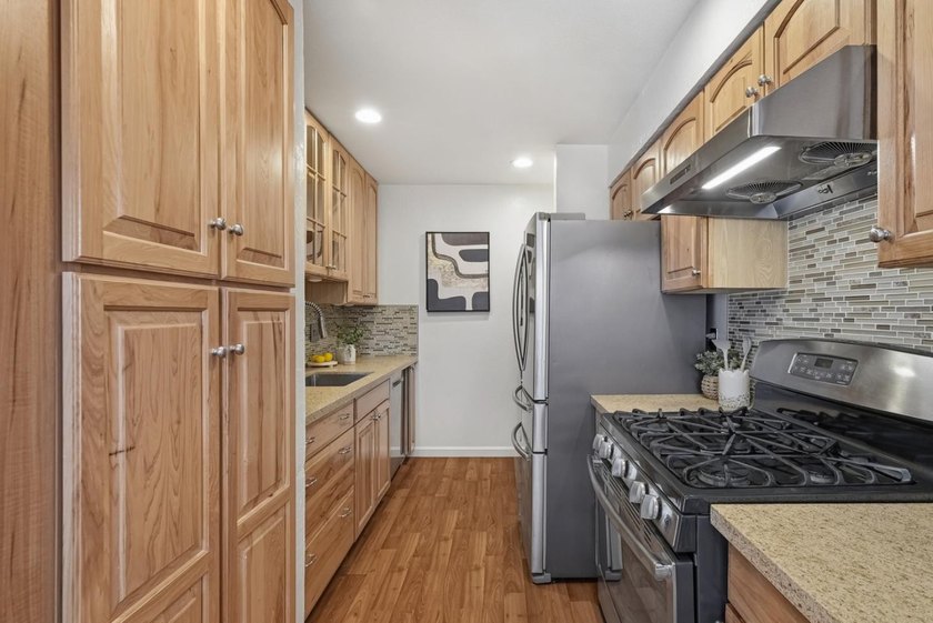 Welcome home to this beautifully updated townhome nestled in a - photo 10