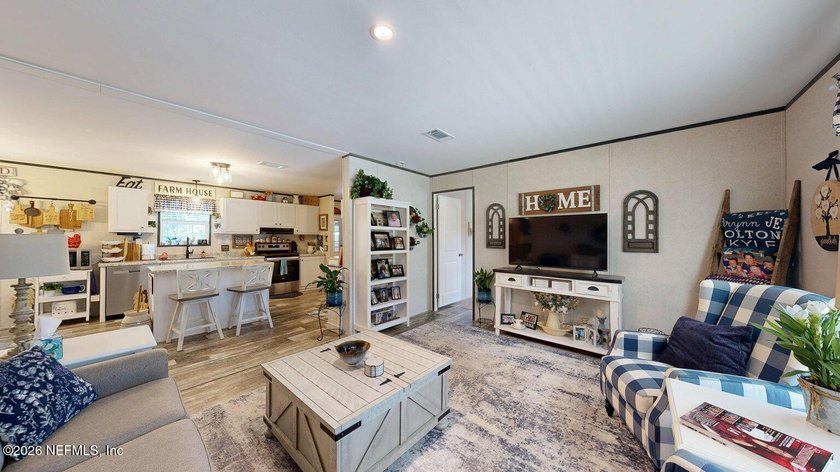 Welcome home to this like-new 2024 manufactured home situated on - photo 5