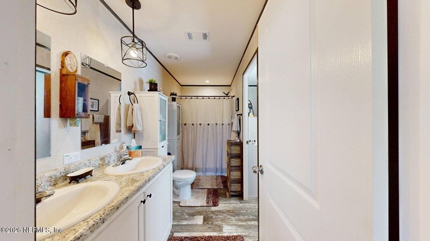 Welcome home to this like-new 2024 manufactured home situated on - photo 10