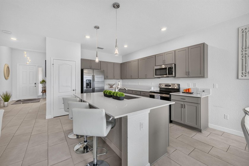 Welcome to this charming 4 bed, 3 full bath, 2 car garage home - photo 8