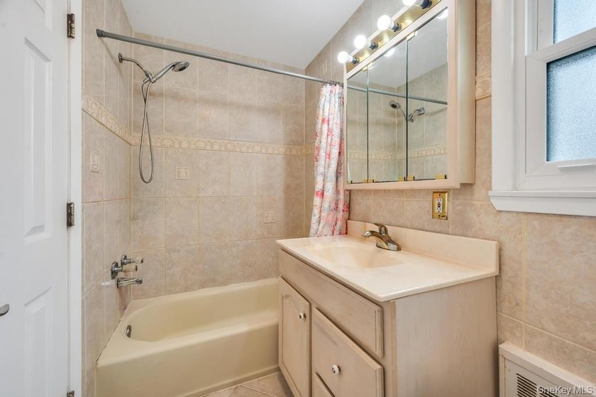 Welcome to 32 Beverly Street in Islip, a spacious Colonial - photo 15
