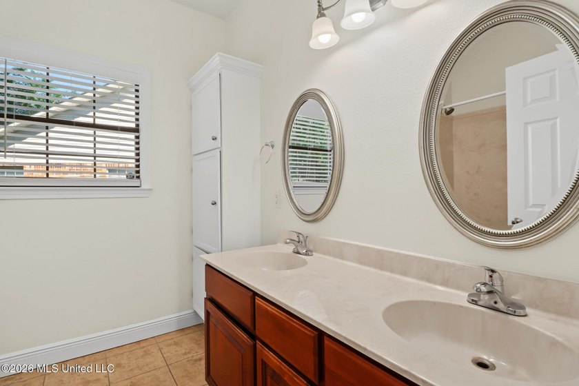 Move-in ready and just minutes from the beach! This beautiful - photo 16