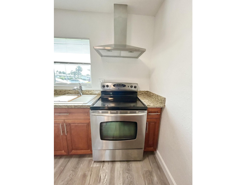 This 1 bedroom 1 bath Villa is like no other in the community - photo 3