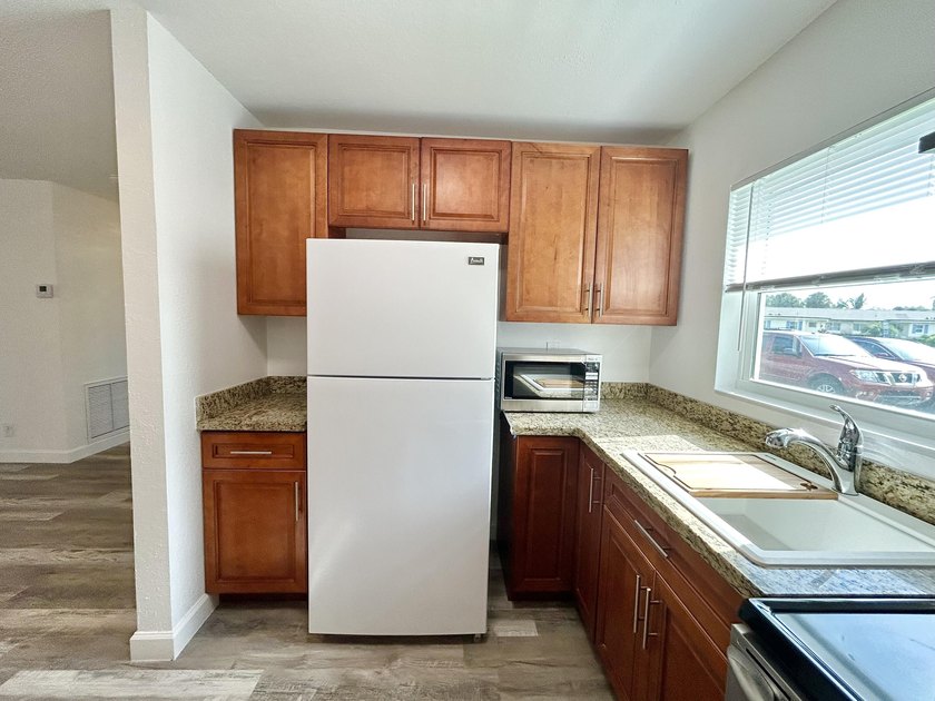 This 1 bedroom 1 bath Villa is like no other in the community - photo 5