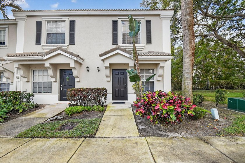 Updated and impeccable end unit townhouse in the highly sought - photo 2