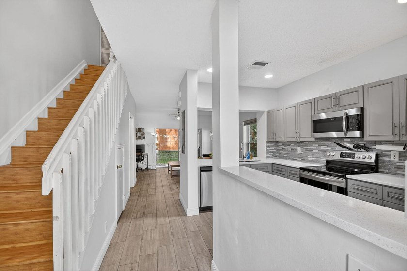 Updated and impeccable end unit townhouse in the highly sought - photo 6