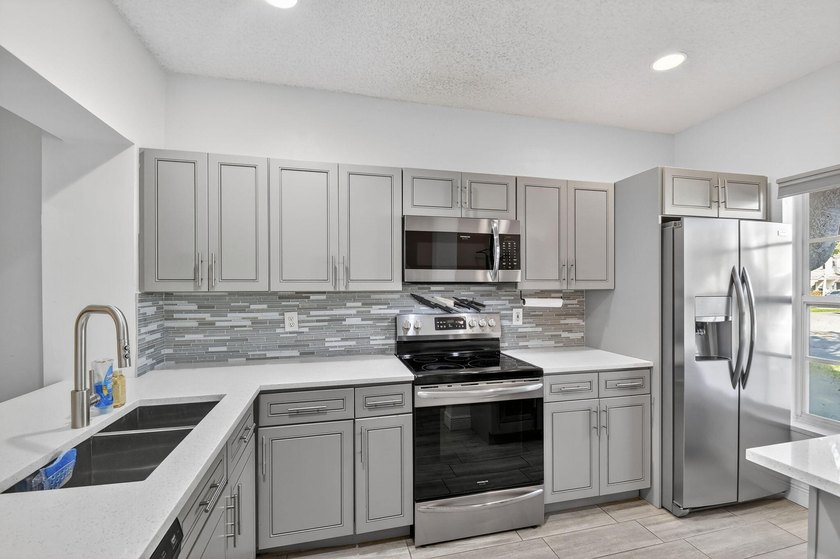 Updated and impeccable end unit townhouse in the highly sought - photo 8