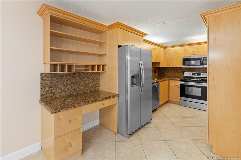 Welcome to this charming 3-bedroom, 2-bath home in a desirable - photo 7