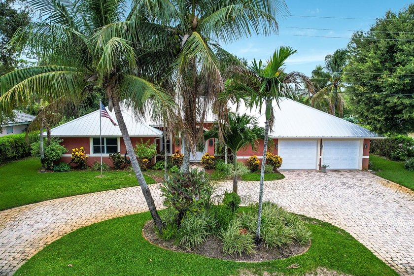 Welcome to Tequesta Country Club, where golf course living meets - photo 3