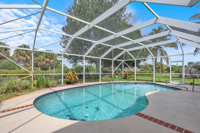 Welcome to Tequesta Country Club, where golf course living meets - photo 6