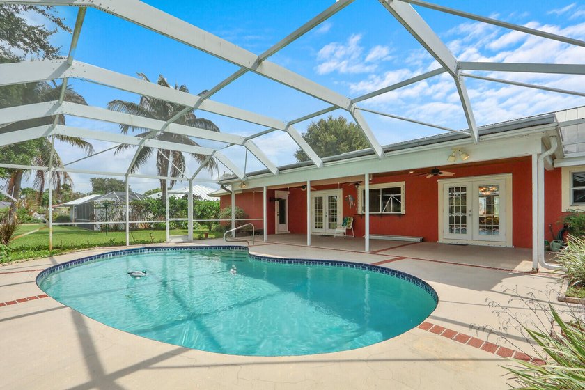 Welcome to Tequesta Country Club, where golf course living meets - photo 7