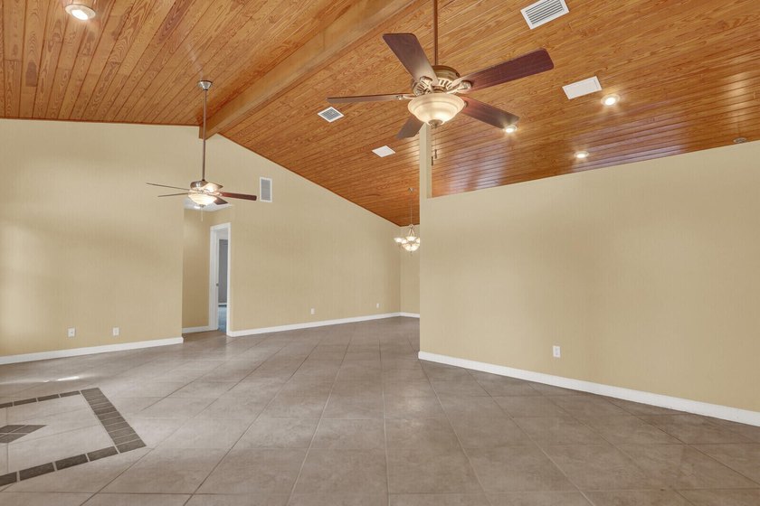 Welcome to Tequesta Country Club, where golf course living meets - photo 10