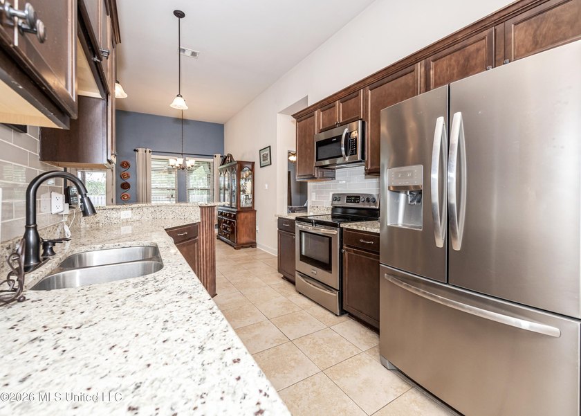 Some homes simply feel welcoming the moment you walk through the - photo 21