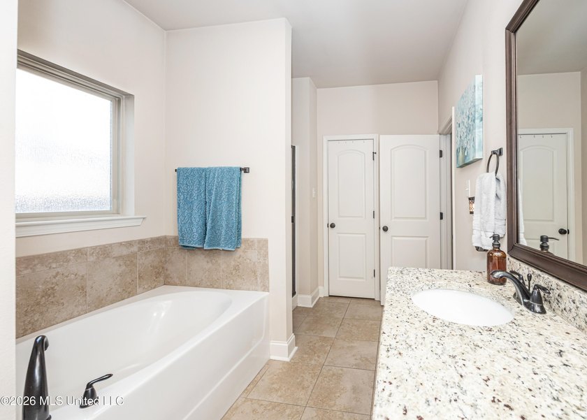 Some homes simply feel welcoming the moment you walk through the - photo 34