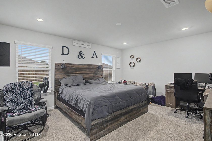 Welcome home to this spacious 4-bedroom, 2-bath property - photo 7