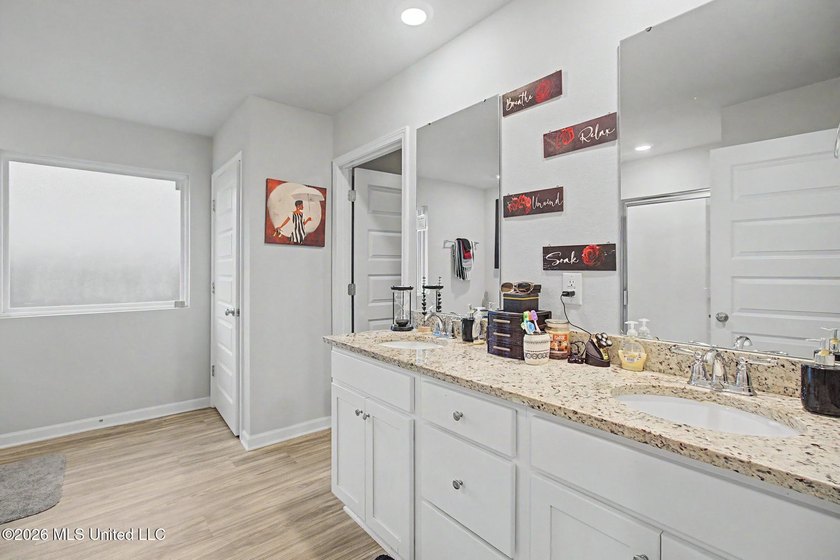 Welcome home to this spacious 4-bedroom, 2-bath property - photo 9