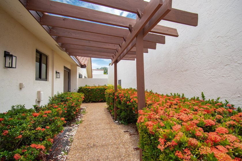 This beautifully updated 3-bedroom, 2-bathroom residence offers - photo 7
