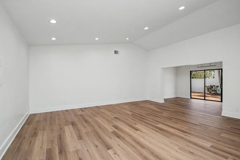 This beautifully updated 3-bedroom, 2-bathroom residence offers - photo 10