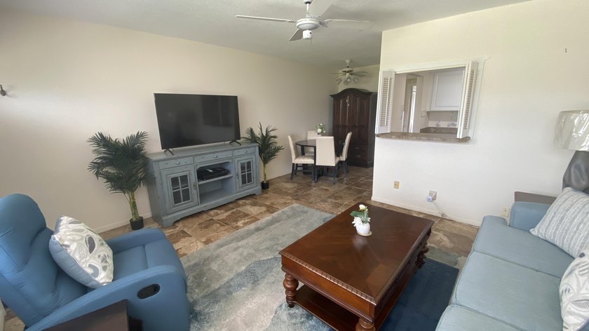 Welcome to this one-bedroom, one-bathroom condominium in the - photo 2