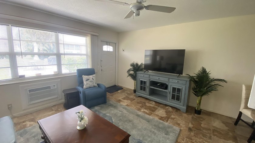 Welcome to this one-bedroom, one-bathroom condominium in the - photo 4