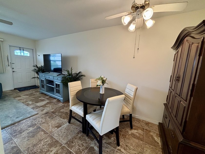 Welcome to this one-bedroom, one-bathroom condominium in the - photo 8