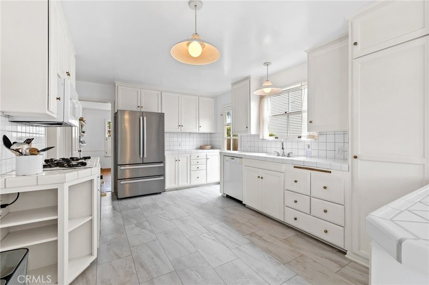 Timeless in character and exceptional in location, this Belmont - photo 6