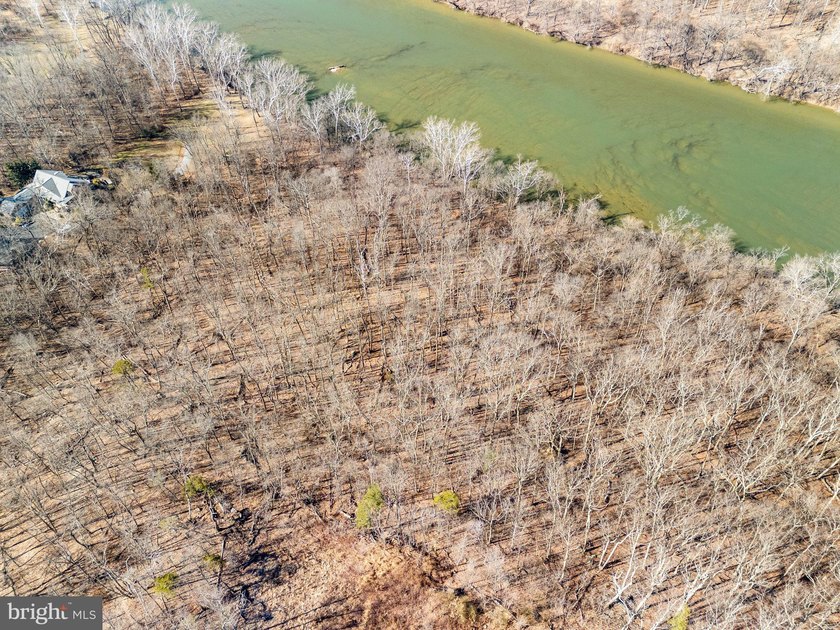 Discover the potential of this 4.9+/- acre waterfront parcel on - photo 11