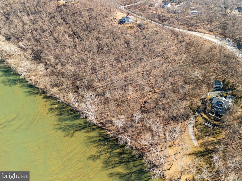 Discover the potential of this 4.9+/- acre waterfront parcel on - photo 13