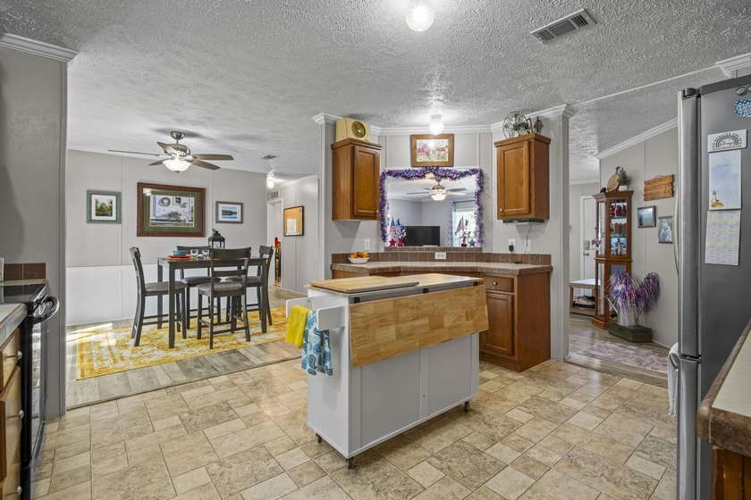 Three-bedroom, two-bathroom, single-story manufactured home with - photo 15