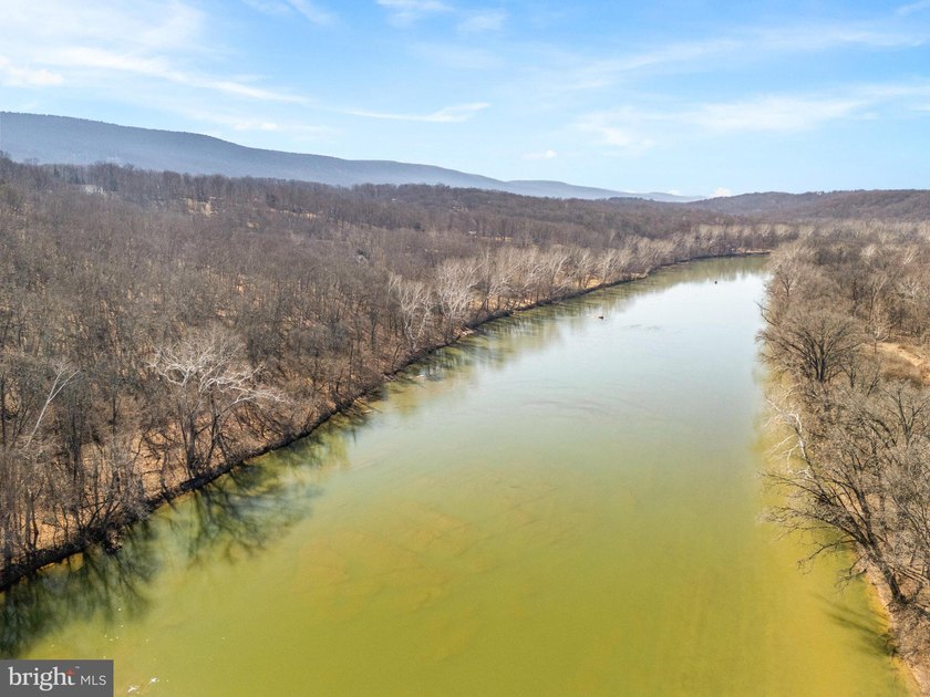 Discover the potential of this 4.9+/- acre waterfront parcel on - photo 17