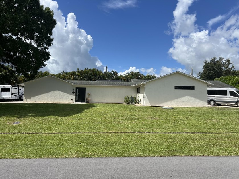 Come discover this single-family POOL HOME on almost HALF AN - photo 2