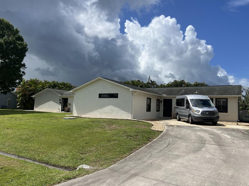 Come discover this single-family POOL HOME on almost HALF AN - photo 3