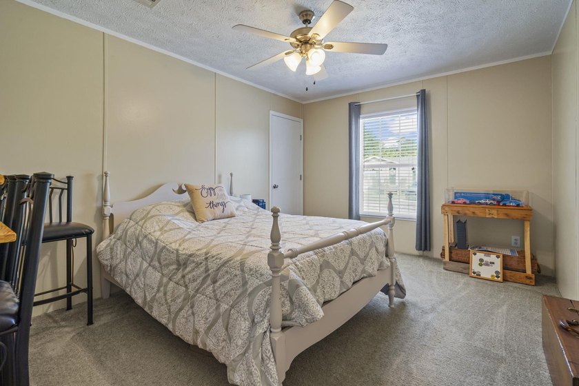 Three-bedroom, two-bathroom, single-story manufactured home with - photo 26