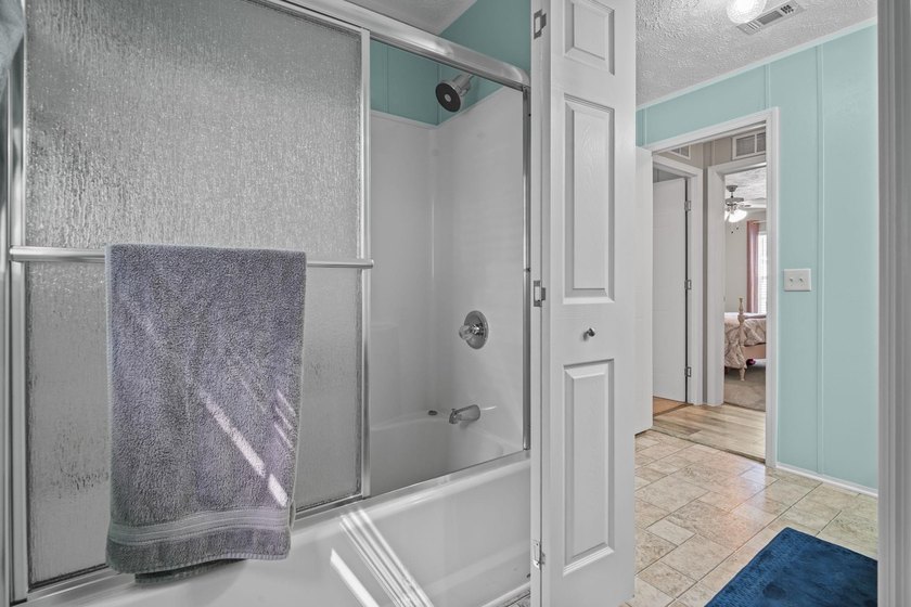 Three-bedroom, two-bathroom, single-story manufactured home with - photo 29