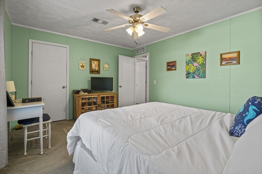 Three-bedroom, two-bathroom, single-story manufactured home with - photo 31