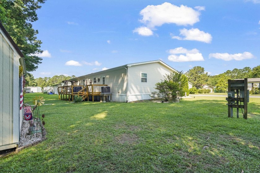 Three-bedroom, two-bathroom, single-story manufactured home with - photo 37