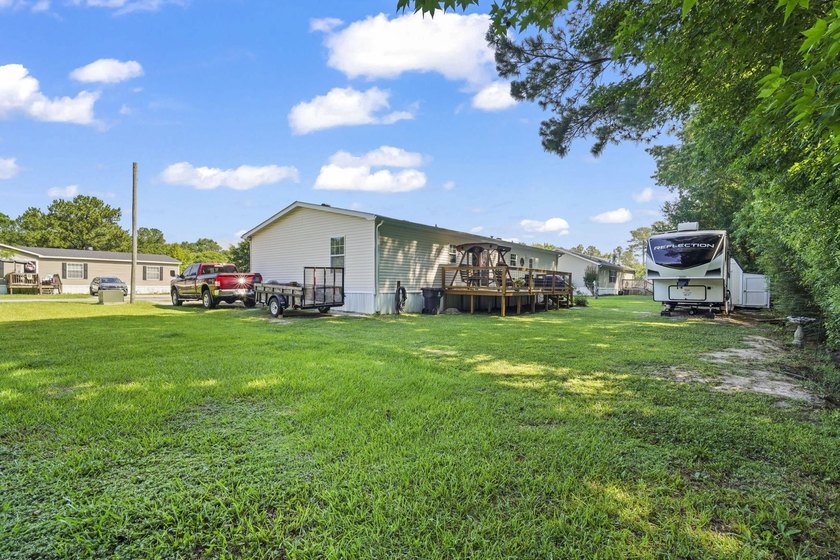 Three-bedroom, two-bathroom, single-story manufactured home with - photo 38