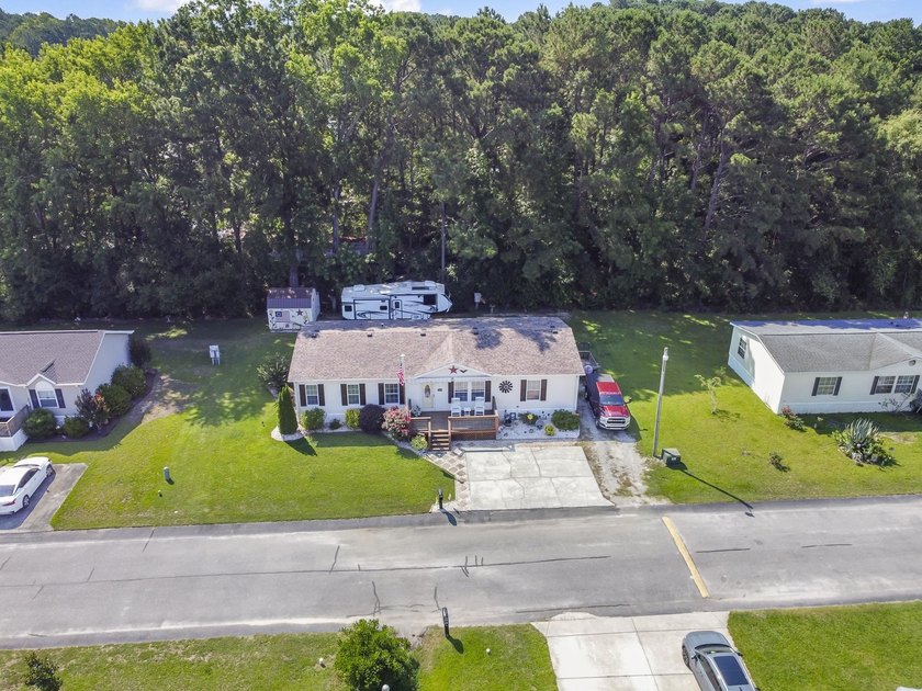 Three-bedroom, two-bathroom, single-story manufactured home with - photo 40